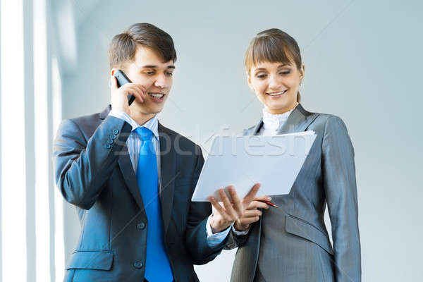 two business partners discussing reports Stock photo © adam121