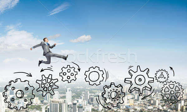 Businessman jumping high Stock photo © adam121