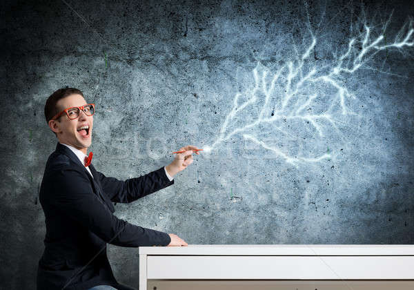Smart guy draw on wall Stock photo © adam121