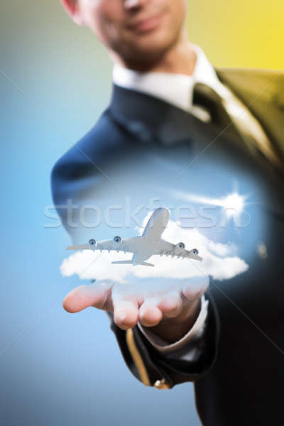 pilot in the form of extending a hand to airplane Stock photo © adam121