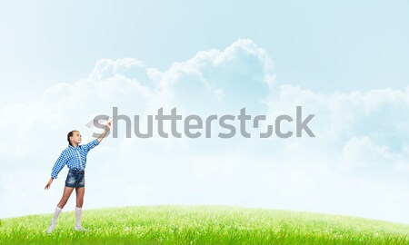Boldog óvatlan gyermekkor imádnivaló kislány tart Stock fotó © adam121