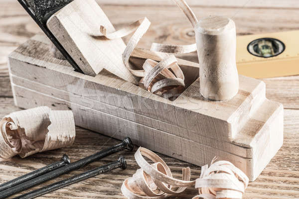 Stock photo: Wooden planer and filings