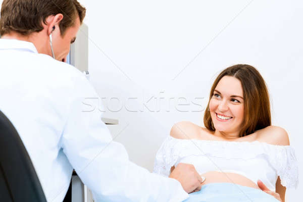 pregnant woman on reception at the doctor Stock photo © adam121