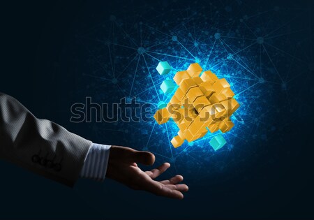 Stock photo: Idea of new technologies and integration presented by cube figure