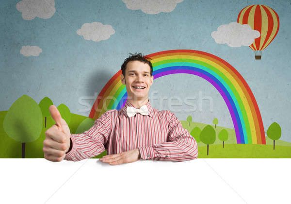 Cheerful man with banner Stock photo © adam121