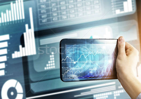 Media technology concept presented by businessman holding tablet Stock photo © adam121