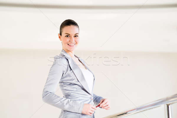 Business woman standing in the lobby of the office Stock photo © adam121