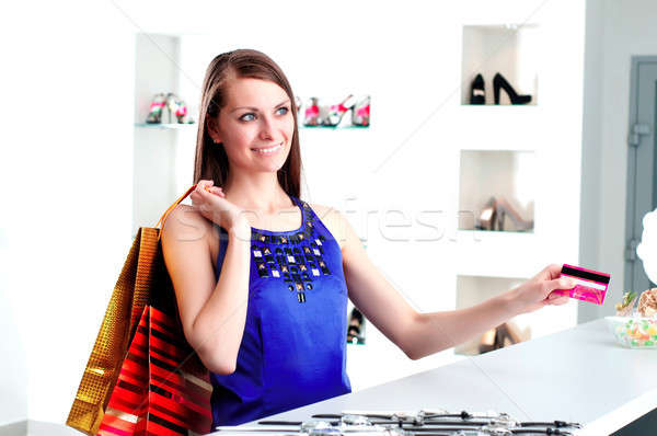 woman at shopping checkout paying credit card Stock photo © adam121