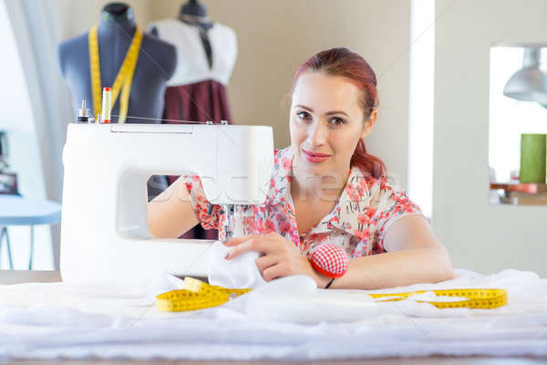 Stock photo: Seamstress at work