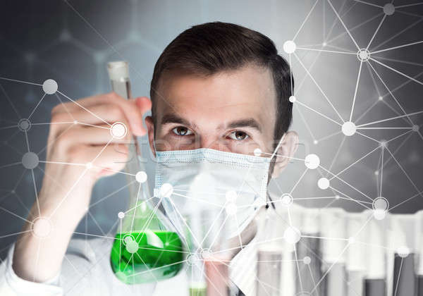 Portrait of concentrated male scientist working with reagents in laboratory Stock photo © adam121