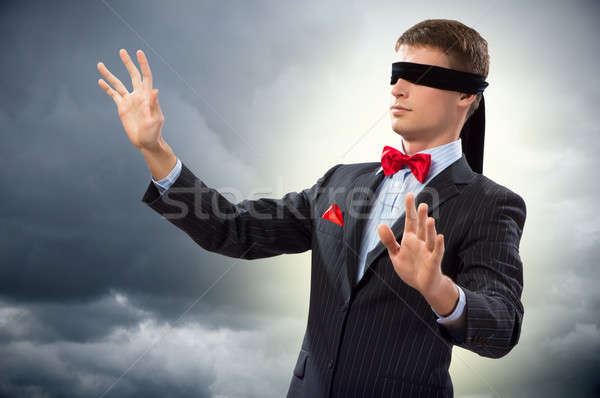 Blindfolded man Stock Photos - Page 1 : Masterfile