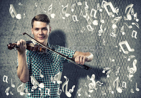 Homem violinista moço casual cimento jogar Foto stock © adam121