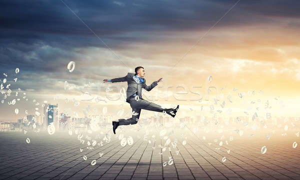 Stock photo: Businessman jumping high