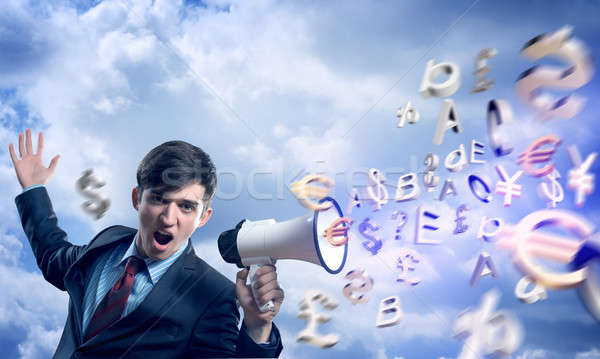 businessman shouting into a megaphone Stock photo © adam121