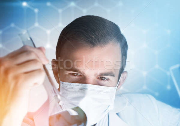Portrait of concentrated male scientist working with reagents in laboratory Stock photo © adam121