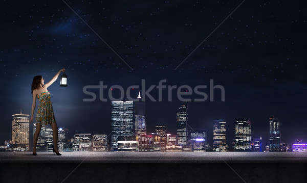 Stock photo: Girl lost in darkness