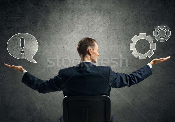 Businessman thinking over his investments Stock photo © adam121