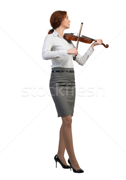 Businesswoman playing violin Stock photo © adam121