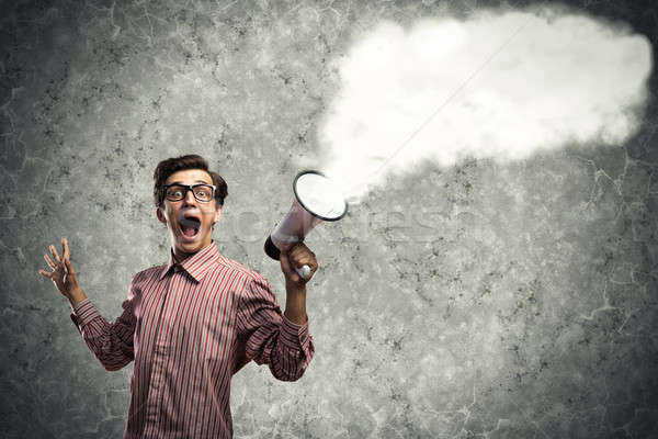 man yells into a megaphone Stock photo © adam121