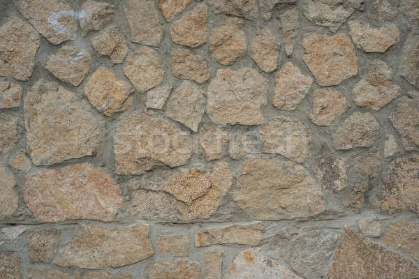 Velho stonewall marrom pedra cimento textura Foto stock © adam121