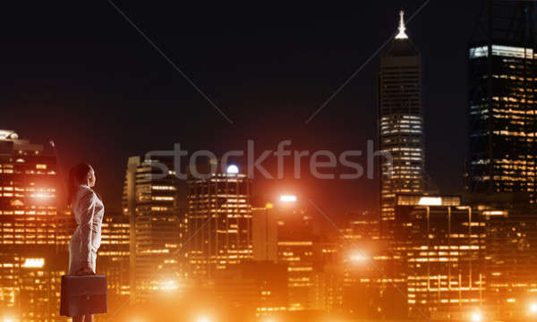 женщину глядя ночь город вид сзади элегантный Сток-фото © adam121