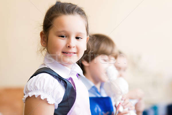 Portrait of Asian girl in apron painting Stock photo © adam121