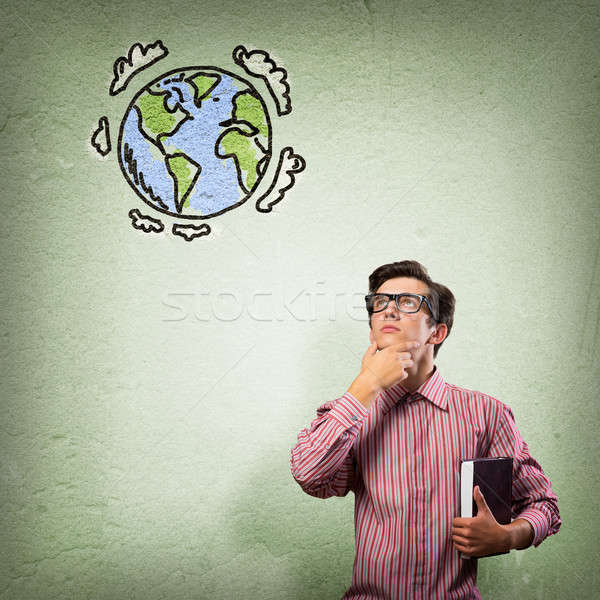 young man with a book thinks Stock photo © adam121