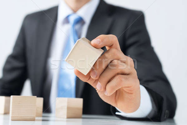 Businessman making tower Stock photo © adam121