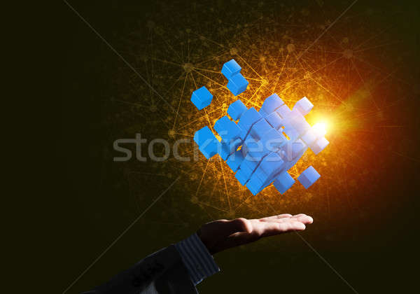 Stock photo: Idea of new technologies and integration presented by cube figure
