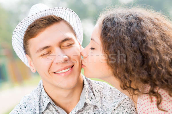 Nina besar hombre mejilla tiempo mujer Foto stock © adam121