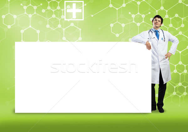 Doctor with banner Stock photo © adam121