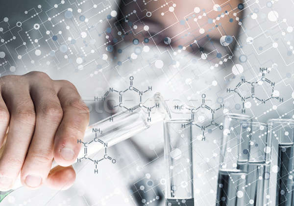 Portrait of concentrated male scientist working with reagents in Stock photo © adam121