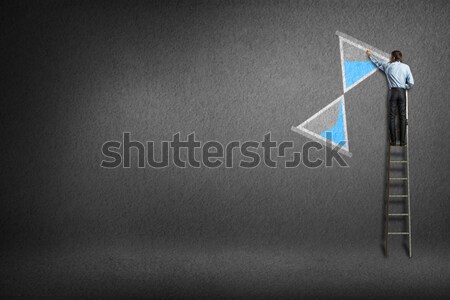 businessman sand clock painted on the wall Stock photo © adam121