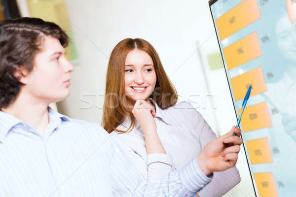 business woman with a colleague discussing reports Stock photo © adam121