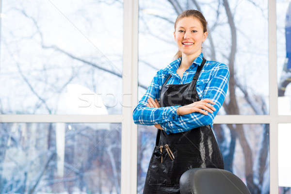  Portrait  of a hairdresser at the salon  stock photo  