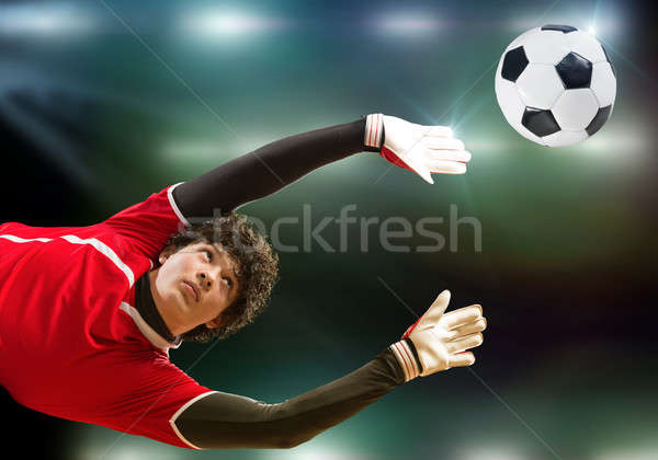 O melhor goleiro retrato saltar grama homem Foto stock © adam121