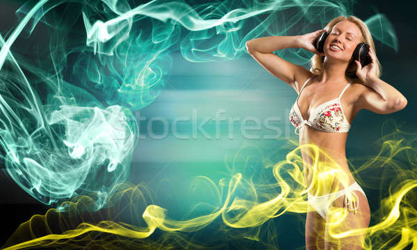 Bikini parti çekici kız beyaz kulaklık renk Stok fotoğraf © adam121