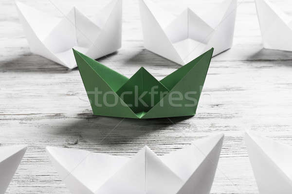 Business leadership concept with white and color paper boats on  Stock photo © adam121