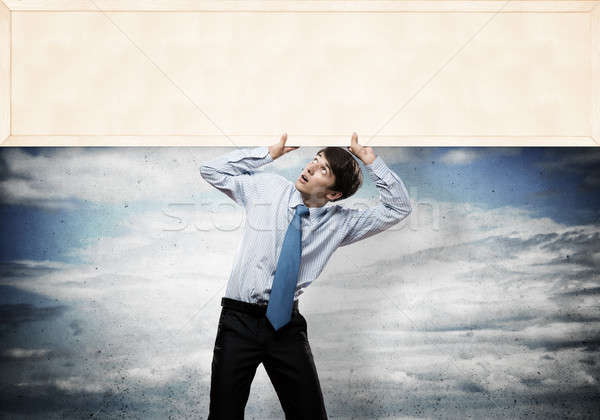 Businessman with blank banner Stock photo © adam121