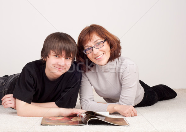 mother and son are together, read magazine Stock photo © adam121