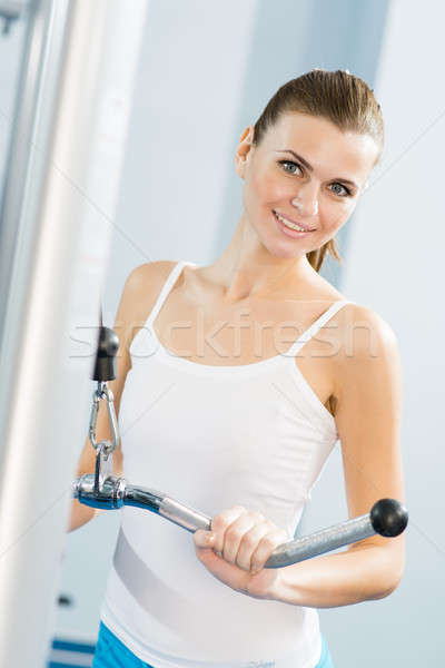 young woman doing body-building in the Gym Stock photo © adam121