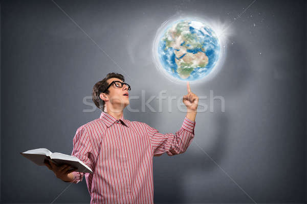young man with a book thinks Stock photo © adam121