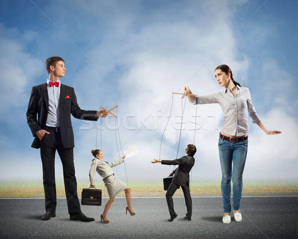 Stock photo: puppets and puppeteers business