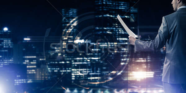 Digital background with infographs and man extending papers or c Stock photo © adam121