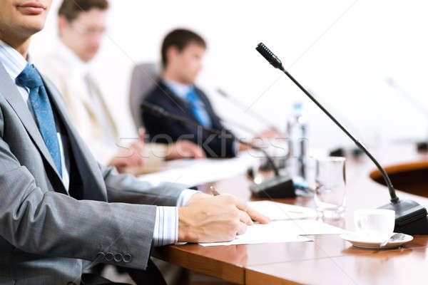 Businessman writing on  paper notes Stock photo © adam121