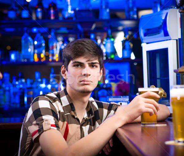 portrait of a young man at the bar Stock photo © adam121
