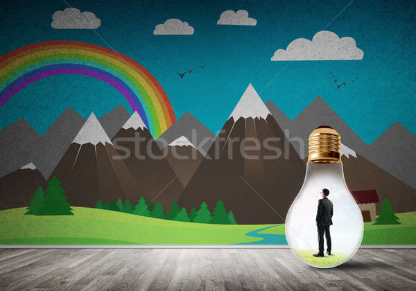 Businessman trapped in bulb Stock photo © adam121