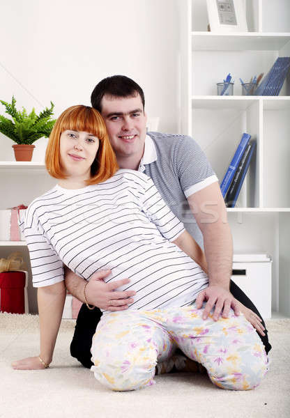 Stock photo: portrait of a husband and a pregnant wife