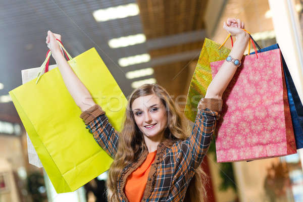 portrait of a beautiful woman in a shopping center Stock photo © adam121