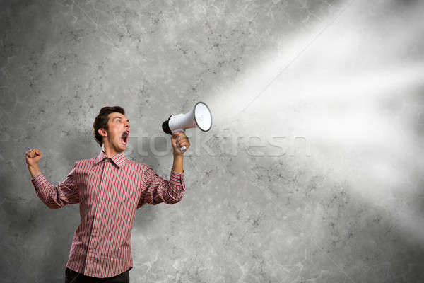 man yells into a megaphone Stock photo © adam121